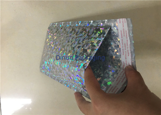 Prenda impermeable rellenada anuncios publicitarios coloreada olográfica de los bolsos del paquete del plástico de burbujas