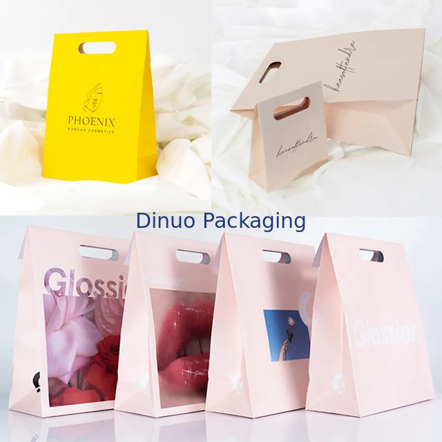 Embalaje de ropa Manija de corte a presión Bolsas de papel Kraft personalizadas Bolsas de regalo amarillas