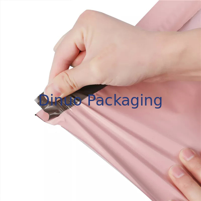 Bolsos de correo impermeables rosados ​​impresos para el embalaje del envío del mensajero del paño del libro
