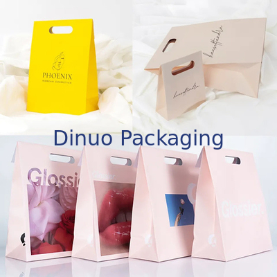 Embalaje de ropa Manija de corte a presión Bolsas de papel Kraft personalizadas Bolsas de regalo amarillas